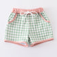 Green plaid boy swim trunks