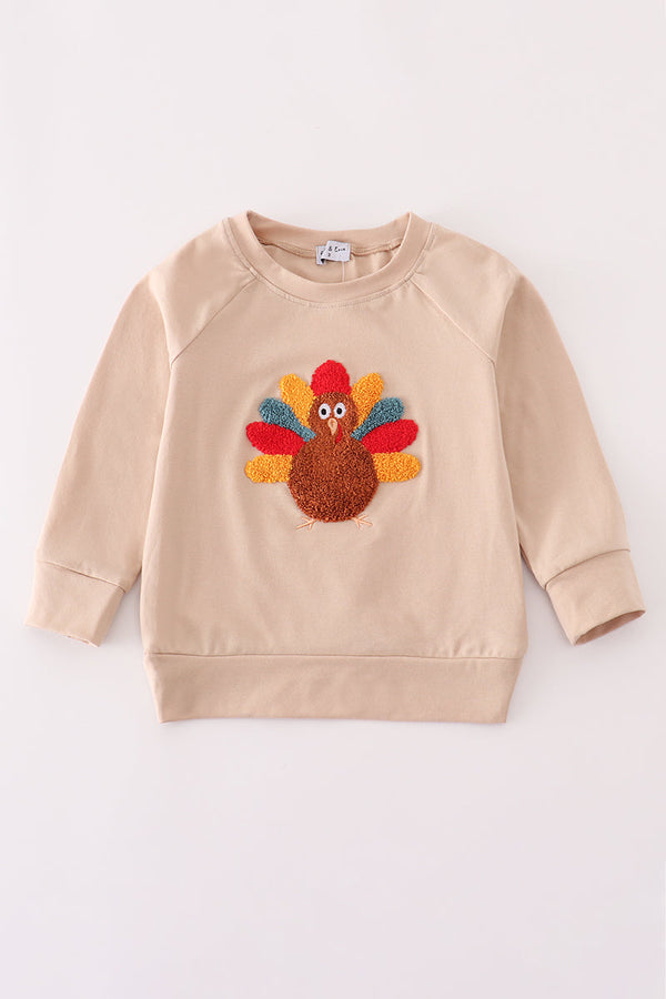 Beige turkey french knot top