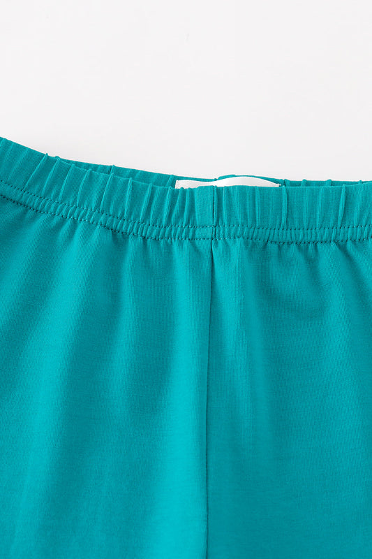 Green ruffle pants