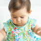 Green lily print ruffle girl baby gown