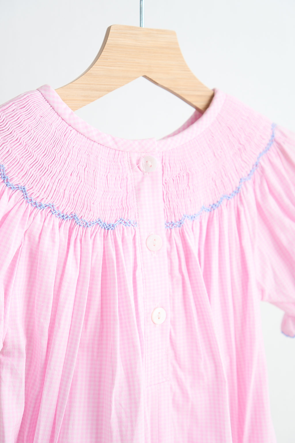 Pink alpaca hand smocked gingham girl romper