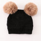 Black double pompom cable beanie