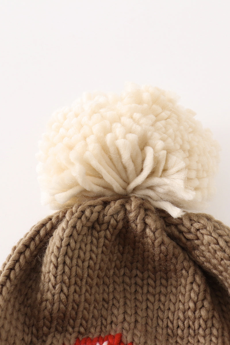 Brown pompom mushroom cable beanie