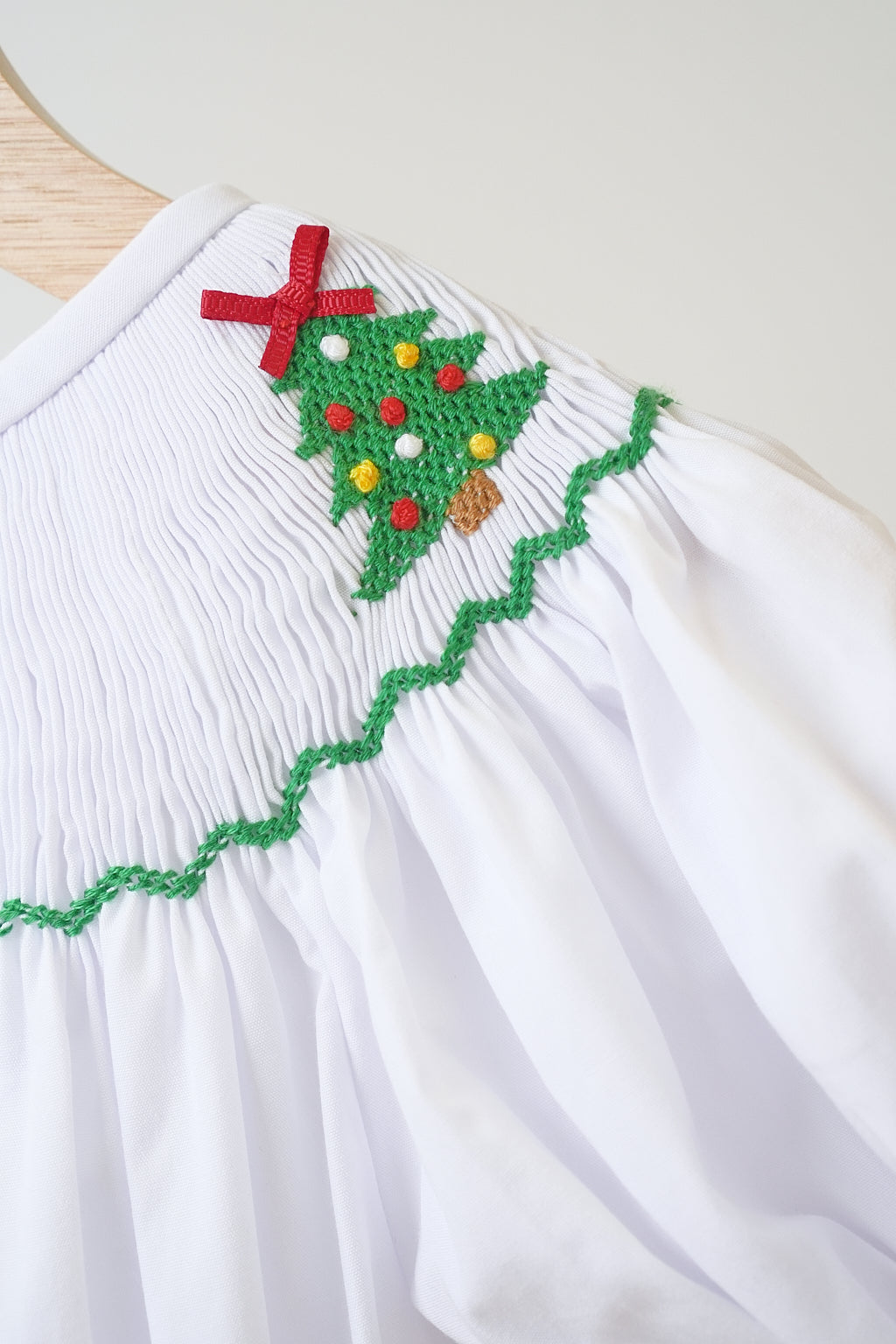 White chrismtas tree hand smocked girl romper