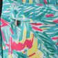 Green lily print backpack bag