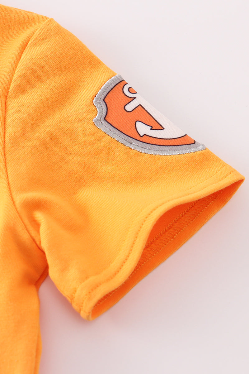 Orange character applique boy top