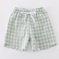 Green seersucker gingham boy swim trunks