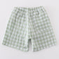 Green seersucker gingham boy swim trunks