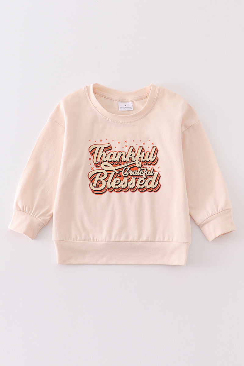 Cream thankful girl top