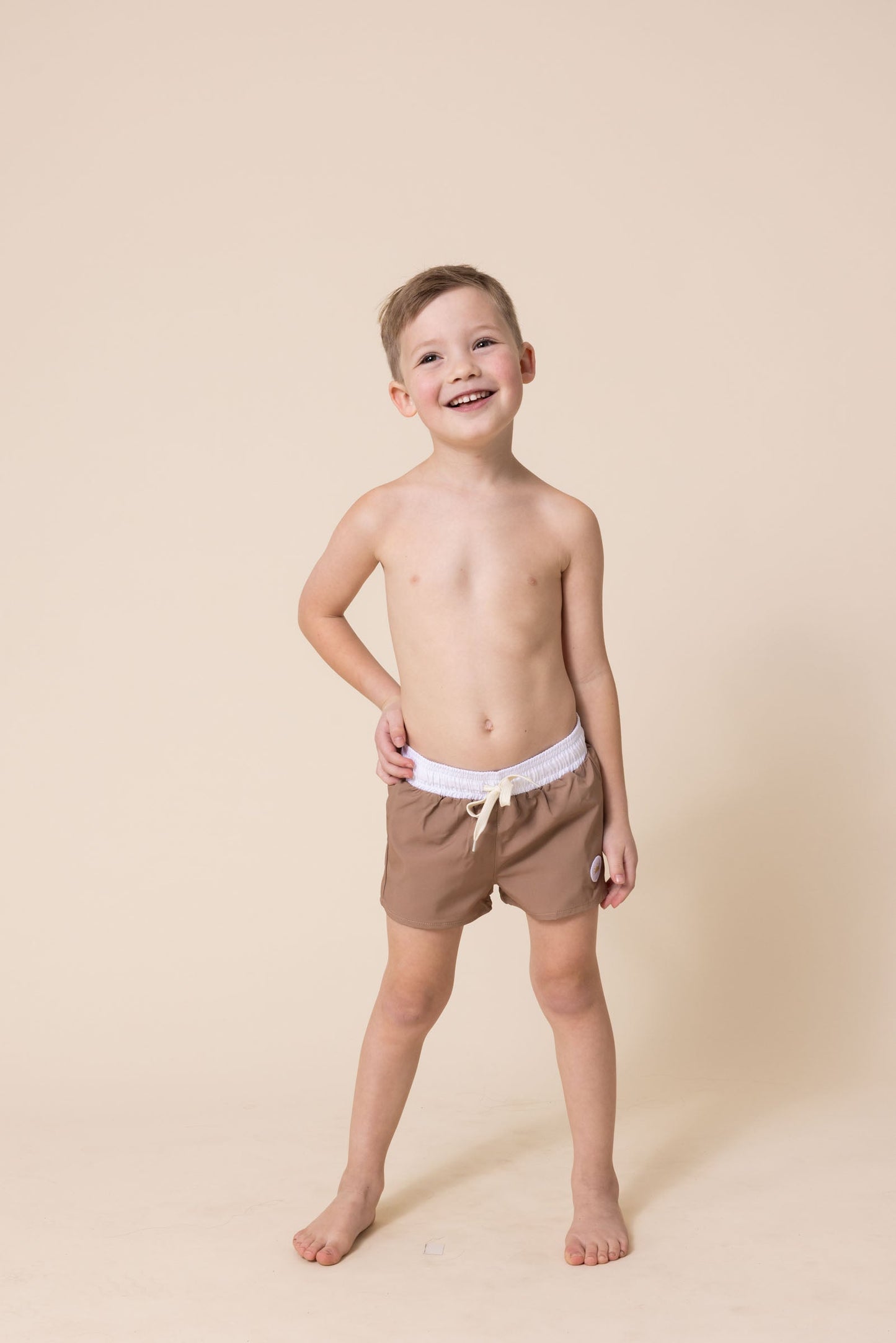 Brown boys swimming trunks